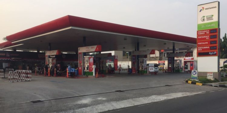 Pertamina Kolaborasi Grab Perkuat Ekosistem Kendaraan Listrik di Indonesia