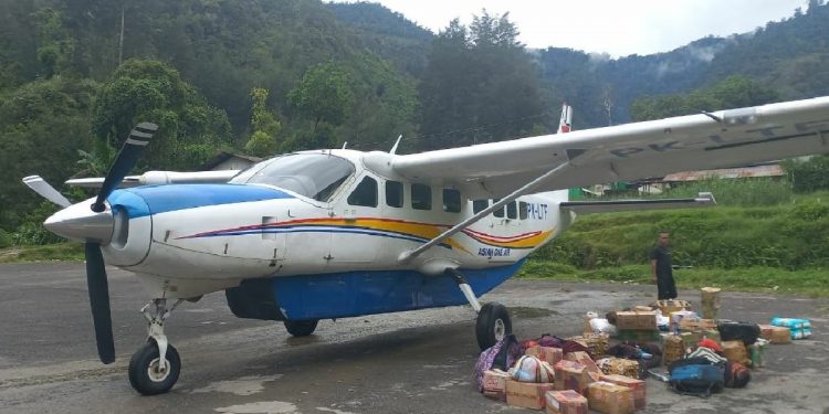 Asian One Air Plane Shot at in Beoga District, Papua