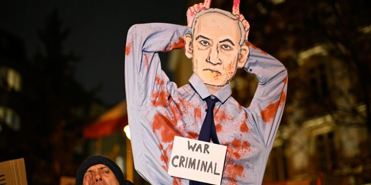 Demonstrators Urge Poland to Arrest Netanyahu